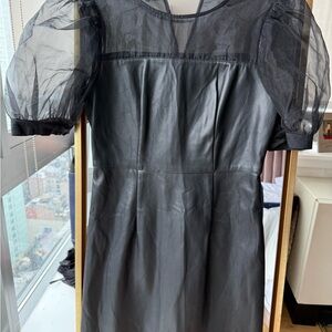 Elegant Black Dress with Sheer Sleeves